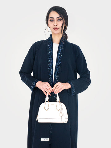 Midnight Petal Abaya in navy with beaded sequin front panel and cuff trim styled - Layaal