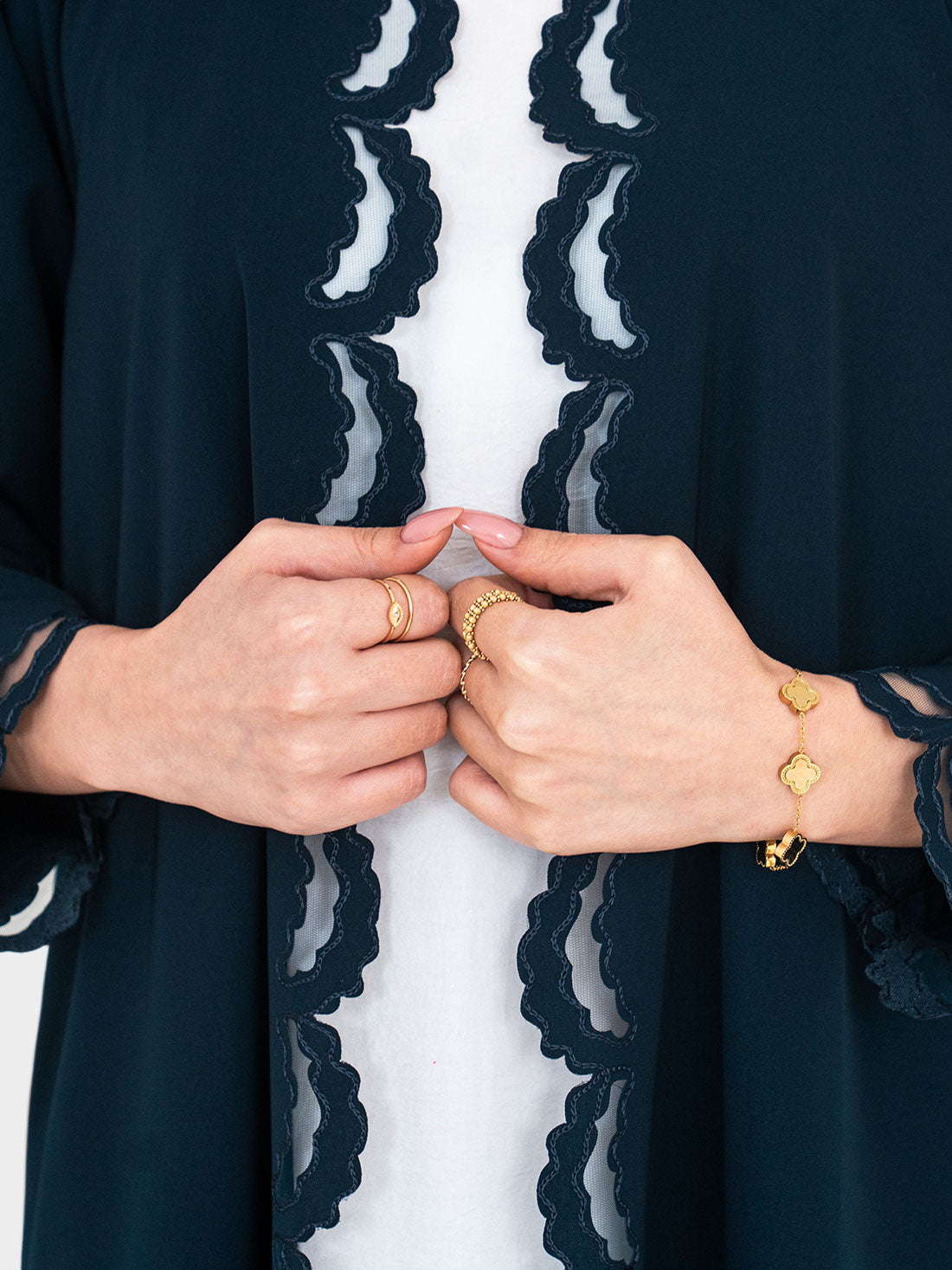 Close-up of Tidal Luxe Abaya scalloped lace front panel detail in teal - Layaal